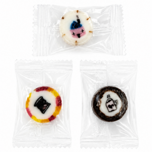 Handcrafted Winter Mix Rock Candy featuring fireplace, coffee cup and house with chimney designs in Fireball, Coffee and Humbug flavours