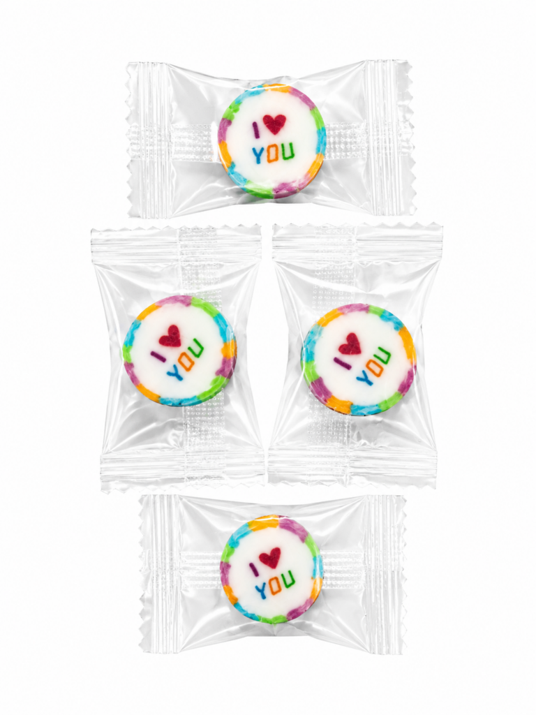Handcrafted I Love You rock candy sweets in humbug flavour individually wrapped on white background